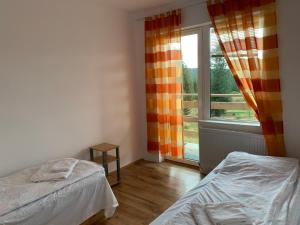 a bedroom with a bed and a window at Weinesya Sunset Smida in Beliş +41 photos