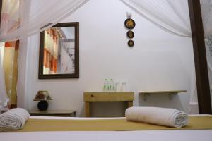 Ένα ή περισσότερα κρεβάτια σε δωμάτιο στο Sheru Guest