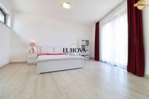 Posteľ alebo postele v izbe v ubytovaní Luxusný rodinný dom v Trenčíne