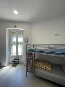 Postel nebo postele na pokoji v ubytování Downtown River Hostel + 24 fotografií