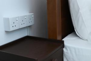 Ένα ή περισσότερα κρεβάτια σε δωμάτιο στο Sheru Guest