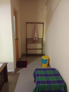 Katil atau katil-katil dalam bilik di Udesh Guest