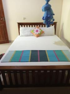 Katil atau katil-katil dalam bilik di Udesh Guest