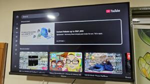 TV a/nebo společenská místnost v ubytování Safari Hotel