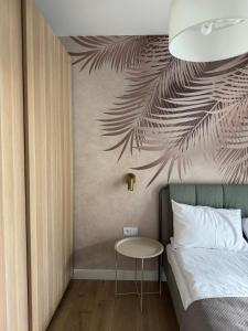 Postel nebo postele na pokoji v ubytování 4SUMMER PALM TREE Perłowa Przystań Parking, 650m do plaży, 650 Meter zum Strand