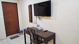 TV a/nebo společenská místnost v ubytování Safari Hotel