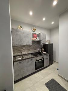 Η κουζίνα ή μικρή κουζίνα στο La casa di Flò