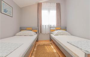 Posteľ alebo postele v izbe v ubytovaní Apartment Vodice With Sea View 11