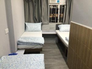Katil atau katil-katil dalam bilik di Ajit guest house