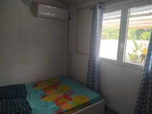 Gambar di galeri bagi BungaBlue à 8 mn de plage Ste Anne di Sainte-Anne