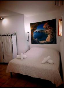 Posteľ alebo postele v izbe v ubytovaní Room Calafatari