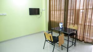 Fotografie z fotogalerie ubytování Easy Stay Eranhipalam v destinaci Kóžikkót