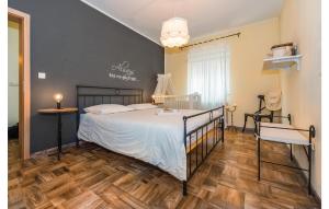 Postel nebo postele na pokoji v ubytování Three-Bedroom Holiday Home In Dubrava