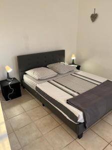 Ένα ή περισσότερα κρεβάτια σε δωμάτιο στο Appartement T2, 55M2, meublé, piscine