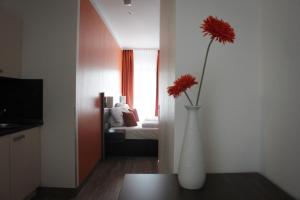 Postel nebo postele na pokoji v ubytování Hotel Rosenhof Garni