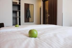 Postel nebo postele na pokoji v ubytování Hotel Rosenhof Garni