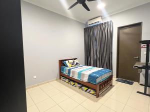 Ένα ή περισσότερα κρεβάτια σε δωμάτιο στο Dany Homestay