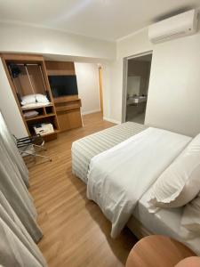 Postel nebo postele na pokoji v ubytování Oitis Hotel