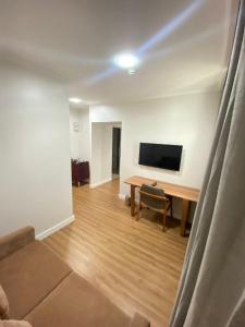 TV a/nebo společenská místnost v ubytování Oitis Hotel + 37 fotografií