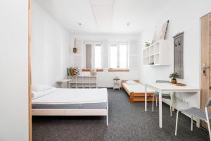 Posteľ alebo postele v izbe v ubytovaní Master Corner Apartment