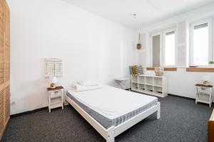 Posteľ alebo postele v izbe v ubytovaní Master Corner Apartment