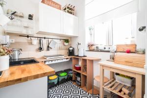 Kuchyňa alebo kuchynka v ubytovaní Master Corner Apartment