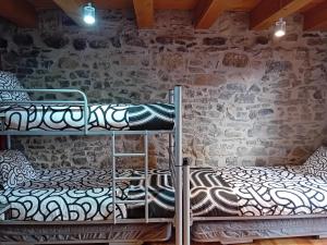 Palanda nebo palandy na pokoji v ubytování Casa Callerín
