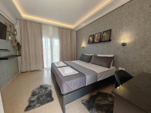 Letto o letti in una camera di Hotel Valerios