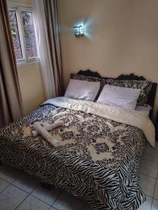 Postel nebo postele na pokoji v ubytování Riad benhamo2 + 5 fotografií