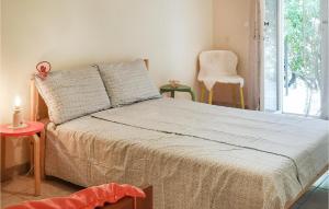 Posteľ alebo postele v izbe v ubytovaní Awesome Apartment In Novalja