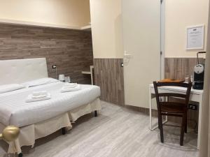 Antico Hotel Moderno客房内的一张或多张床位