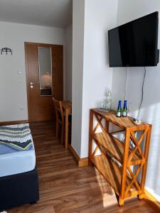 TV a/nebo společenská místnost v ubytování Atelier Reinhart