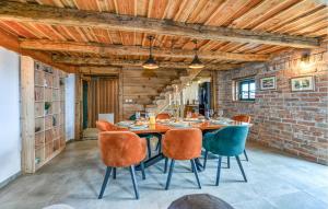 a dining room with a table and chairs at Lovely Home In Lestakovec With Kitchen in Leštakovec