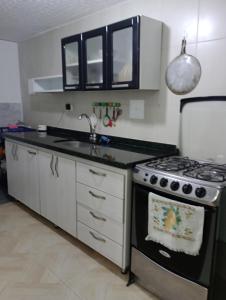 Dapur atau dapur kecil di Apartamento Familiar +1 gambar