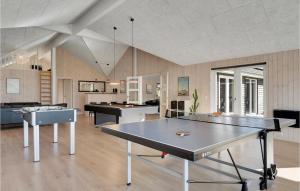 a large room with a ping pong table in it at Gorgeous Home In Frederiksværk in Frederiksværk