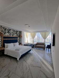 Postel nebo postele na pokoji v ubytování Hotel Presidente Beach Playas