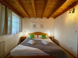 Postel nebo postele na pokoji v ubytování Chata 107 Tatralandia Village