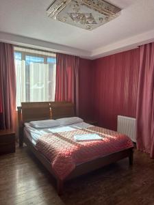 Katil atau katil-katil dalam bilik di Hotel in Bakuriani