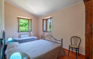 A bed or beds in a room at Valguerriera - Rosa Bianca