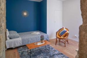 Ένα ή περισσότερα κρεβάτια σε δωμάτιο στο Casa do EL