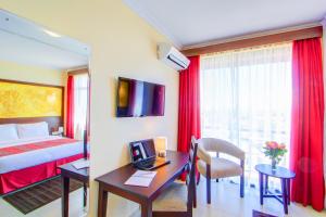 Μια τηλεόραση ή/και κέντρο ψυχαγωγίας στο Vittoria Suites