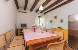 Telewizja i/lub zestaw kina domowego w obiekcie Holiday Home Bibinjskih Mlikaric Bb Iv