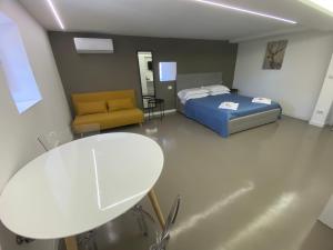 Letto o letti in una camera di B&B Suite Cutelli