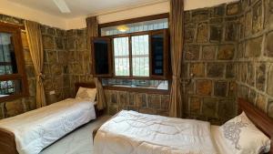 Voodi või voodid majutusasutuse Bald Sayt Guest House toas