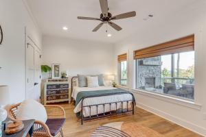 ein Schlafzimmer mit einem Bett und einem Kamin in der Unterkunft Modern Mtn Cabin with Deck and Views in Blue Ridge! in Blue Ridge