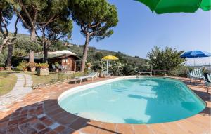 The swimming pool at or close to 3 Bedroom Stunning Home In Uzzano Pt