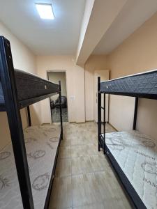 Uma cama ou camas num quarto em Ana
