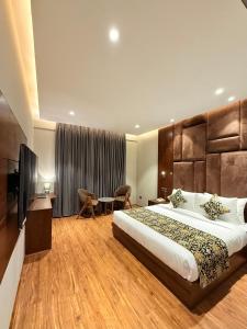 Katil atau katil-katil dalam bilik di The Olive Hotel Srinagar