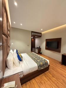 Katil atau katil-katil dalam bilik di The Olive Hotel Srinagar