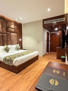 Katil atau katil-katil dalam bilik di The Olive Hotel Srinagar